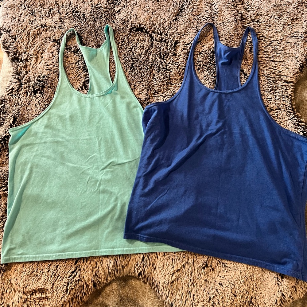 Men’s Stringer workout tank. 2 shades of blue. Soft and thin. Great condition.